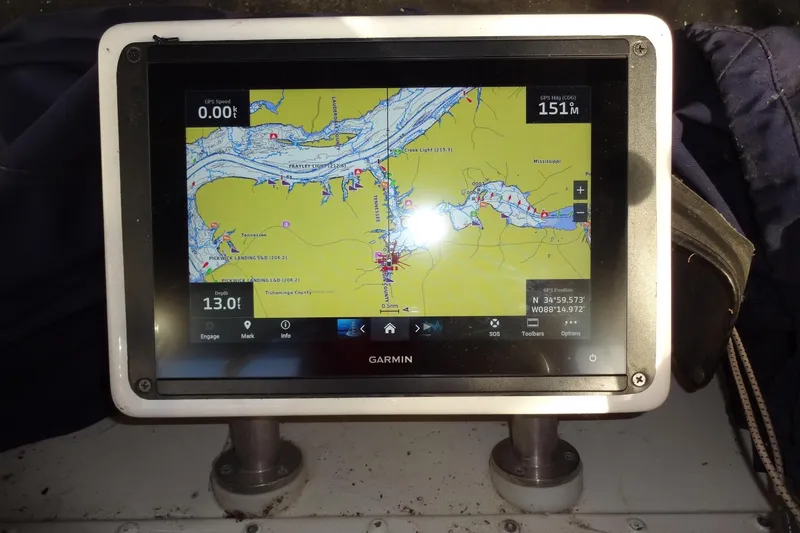 Slide: The Image of Garmin GPS display on 1977 Hatteras 53 Motor Yacht, showing navigation map and coordinates. - 135