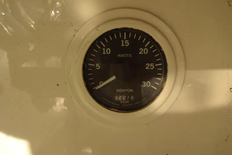 Slide: The Image of Speedometer of 1977 Hatteras 53 Motor Yacht, displaying speed in knots. - 140