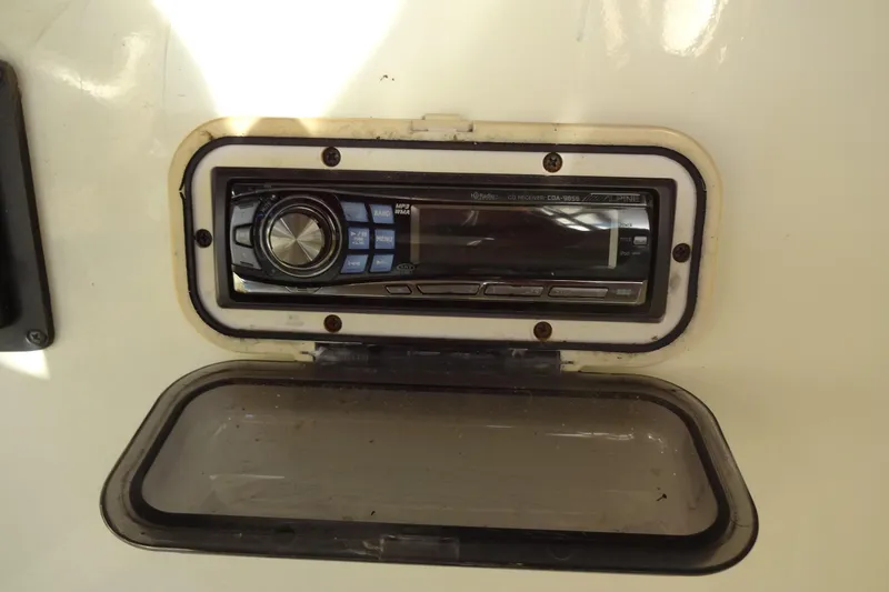 Slide: The Image of Audio system on a 1977 Hatteras 53 Motor Yacht, featuring an Alpine CD receiver. - 143