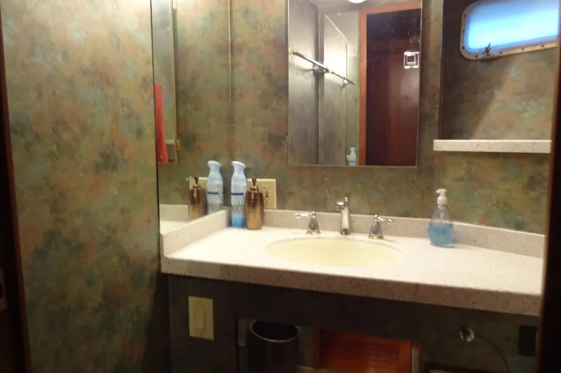 Slide: The Image of Bathroom interior of 1977 Hatteras 53 Motor Yacht with sink and mirror. - 42
