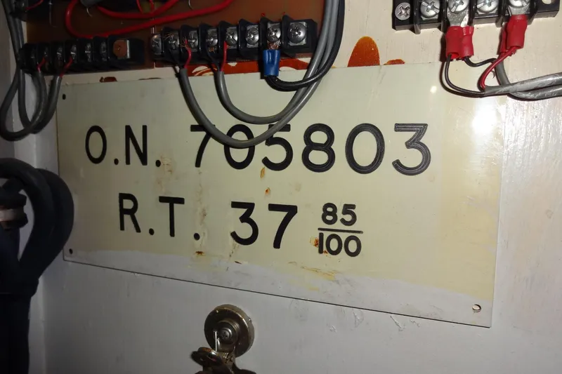 Slide: The Image of Electrical panel with registration plate on 1977 Hatteras 53 Motor Yacht. - 72