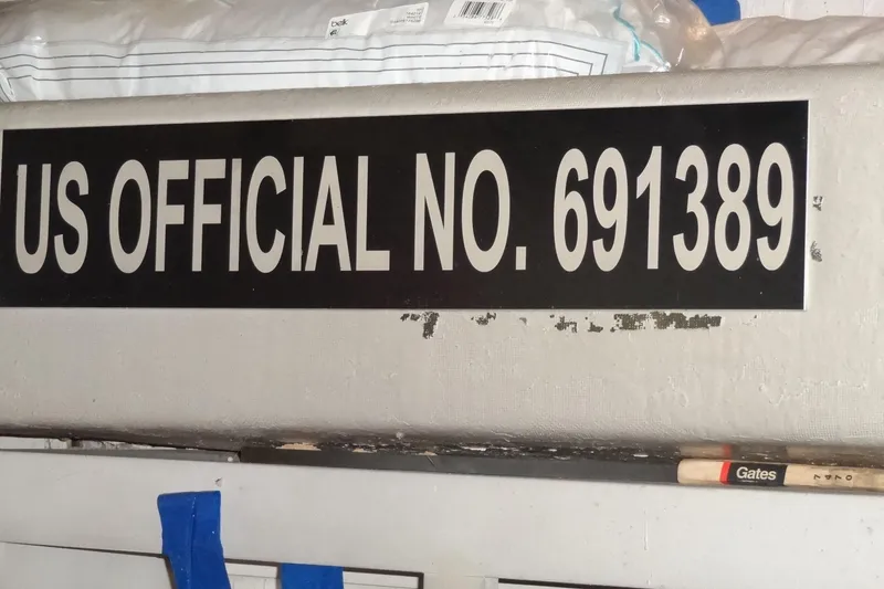 Slide: The Image of 1977 Hatteras 53 Motor Yacht with US Official Number 691389 displayed. - 73