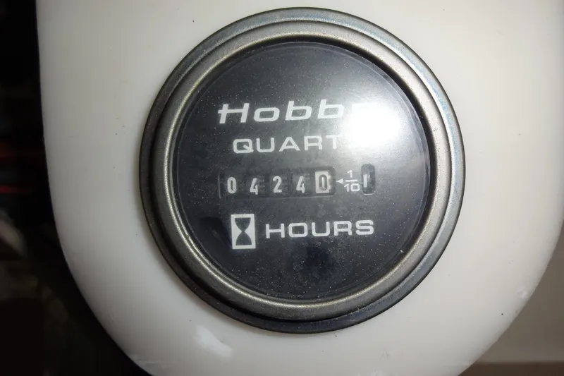 Slide: The Image of Hobbs hour meter showing 4240.1 hours on 1977 Hatteras 53 Motor Yacht. - 82