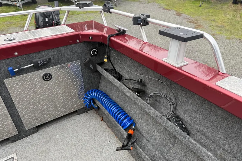 Slide: The Image of Interior of 2010 Thunder Jet 21 Luxor OB boat with storage and equipment. - 16