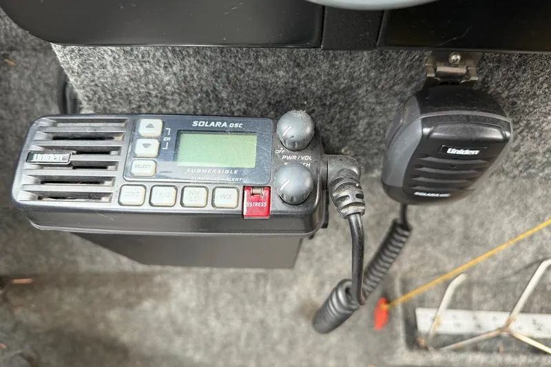 Slide: The Image of Control panel of a 2010 Thunder Jet 21 Luxor OB boat with Suzuki throttle. - 25