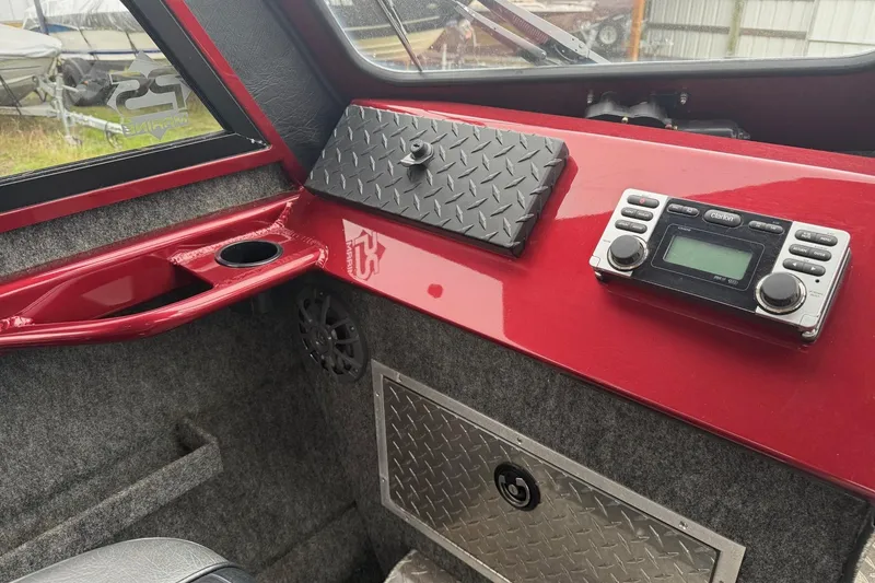 Slide: The Image of Steering console of 2010 Thunder Jet 21 Luxor OB with Humminbird display. - 30