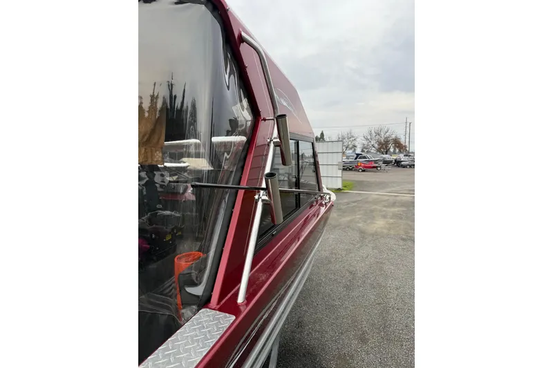 Slide: The Image of Interior light fixture in 2010 Thunder Jet 21 Luxor OB boat, black leather ceiling. - 44