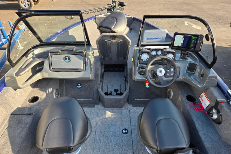 Slide: The Image of 2021 Tracker Pro Guide V-175 Combo boat interior with steering console and seating. - 82