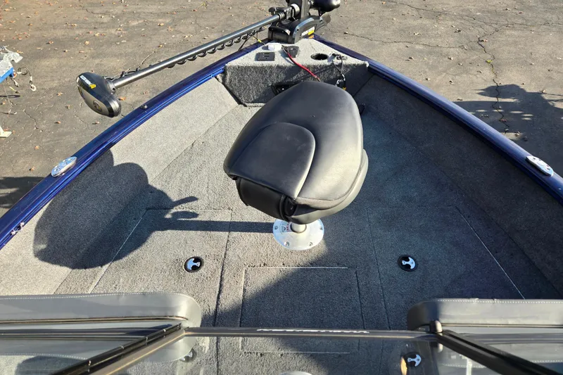 Slide: The Image of 2021 Tracker Pro Guide V-175 Combo boat interior with swivel seat and trolling motor. - 83