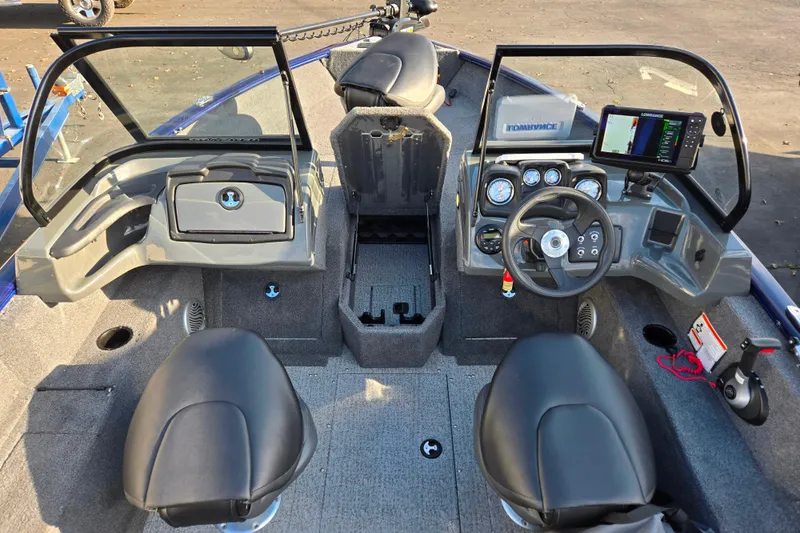 Slide: The Image of 2021 Tracker Pro Guide V-175 Combo boat interior with steering console and seating. - 84