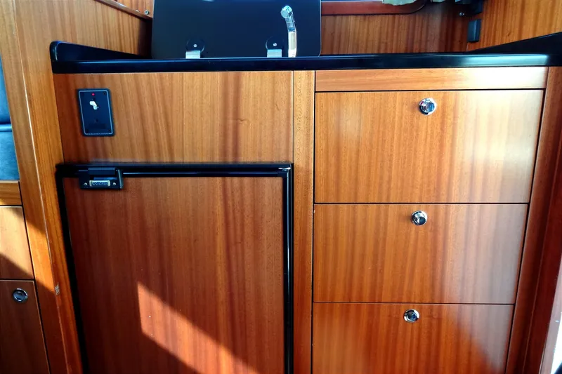 Slide: The Image of Wooden interior cabinetry of a 2016 North Aegean Trawler 30 boat. - 33