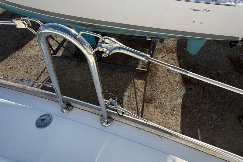 Slide: The Image of Stainless steel rigging on a 2008 Beneteau 31 sailboat, docked on land. - 19