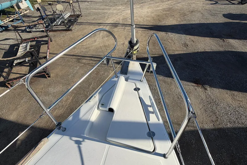 Slide: The Image of Bow of a 2008 Beneteau 31 sailboat with stainless steel railings. - 22