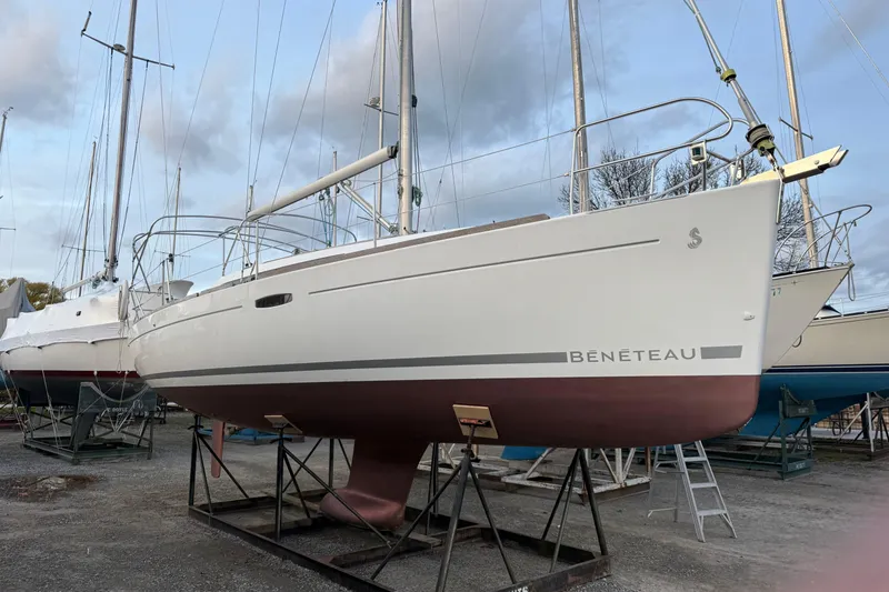 Slide: The Image of 2008 Beneteau 31 sailboat on stands, ready for maintenance in a boatyard. - 3