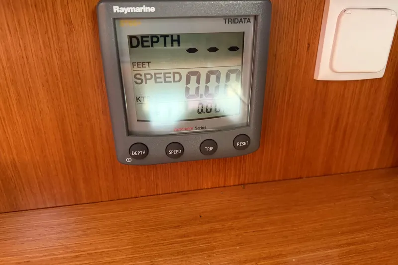 Slide: The Image of Raymarine Tridata display on 2008 Beneteau 31, showing depth and speed readings. - 50