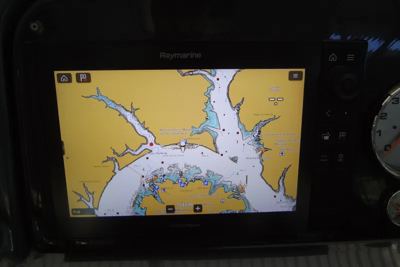 Slide: The Image of Raymarine navigation display on 2019 Formula 400 Super Sport boat dashboard. - 10