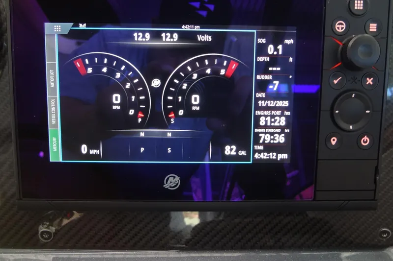 Slide: The Image of Dashboard display of a 2019 Formula 400 Super Sport boat showing engine metrics and controls. - 11