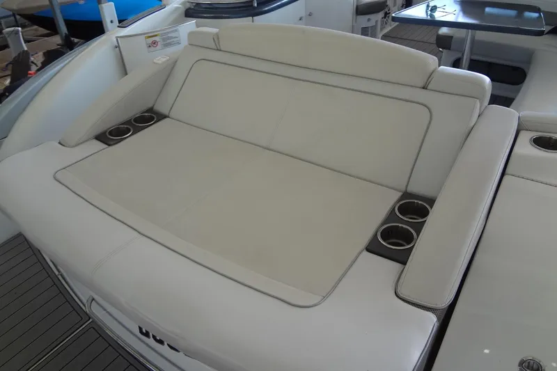 Slide: The Image of Luxurious seating area on a 2019 Formula 400 Super Sport boat with cup holders. - 17