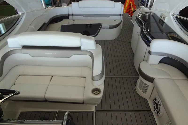 Slide: The Image of Luxurious interior of a 2019 Formula 400 Super Sport boat with elegant seating. - 28