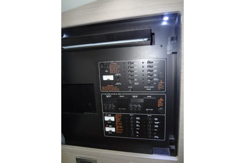 Slide: The Image of Control panel of a 2019 Formula 400 Super Sport boat, featuring various switches and indicators. - 43