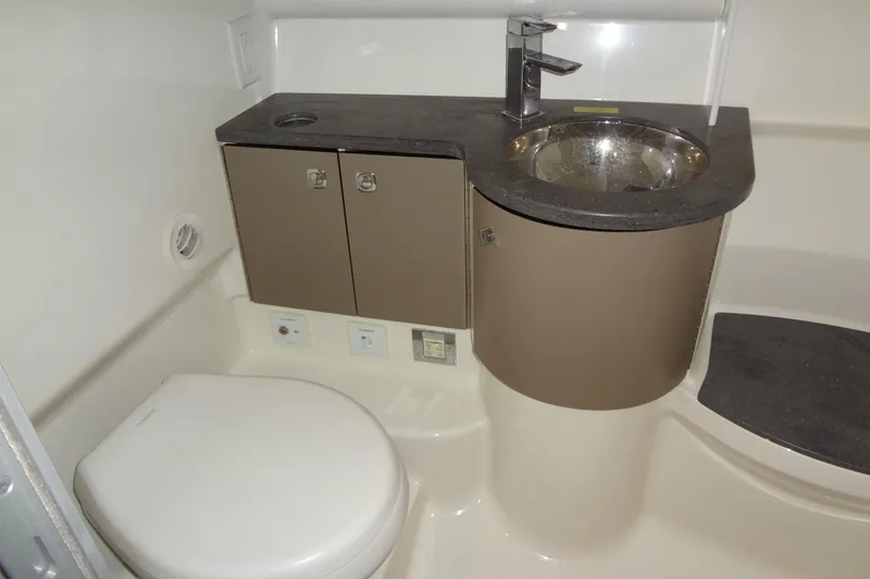 Slide: The Image of 2019 Formula 400 Super Sport bathroom with modern sink and toilet design. - 48