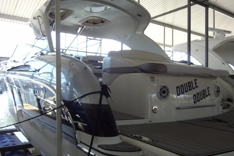 Slide: The Image of 2019 Formula 400 Super Sport yacht in marina, rear view, named "Double Double". - 52