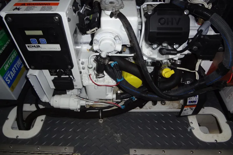 Slide: The Image of Engine compartment of a 2019 Formula 400 Super Sport with Kohler generator. - 57