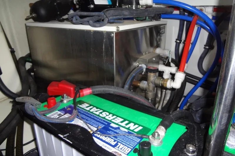 Slide: The Image of Engine compartment of 2019 Formula 400 Super Sport with battery and wiring. - 61