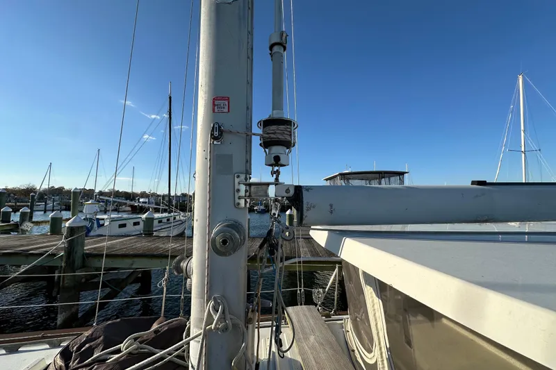 Slide: The Image of 1978 CSY 44 Cutter Rig sailboat mast and rigging at marina dock. - 9