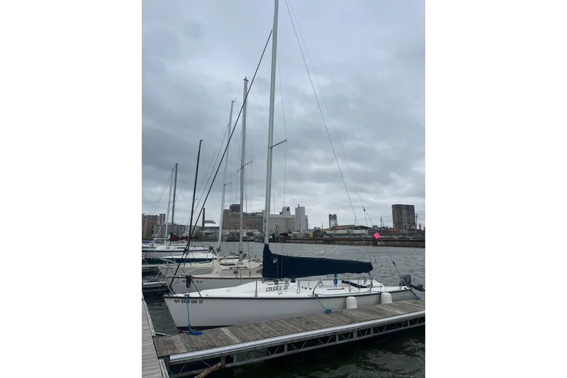 Slide: The Image of Sailboat docked at marina, Colgate 26 model, 2004, overcast sky. - 2
