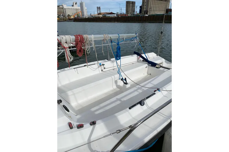 Slide: The Image of Sailboat cockpit with ropes, Colgate 26, 2004 model, docked in an industrial harbor. - 6