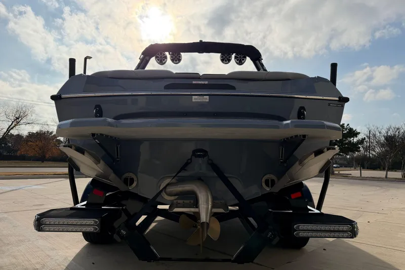 Slide: The Image of 2026 MB B52 23 Classic boat rear view under sunny sky. - 5