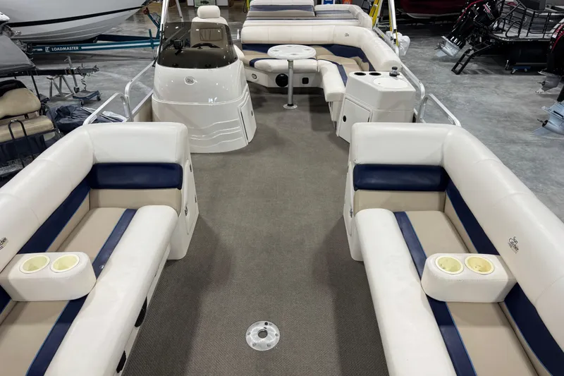 Slide: The Image of Pontoon boat interior with beige and blue seating, 2005 G3 model. - 10