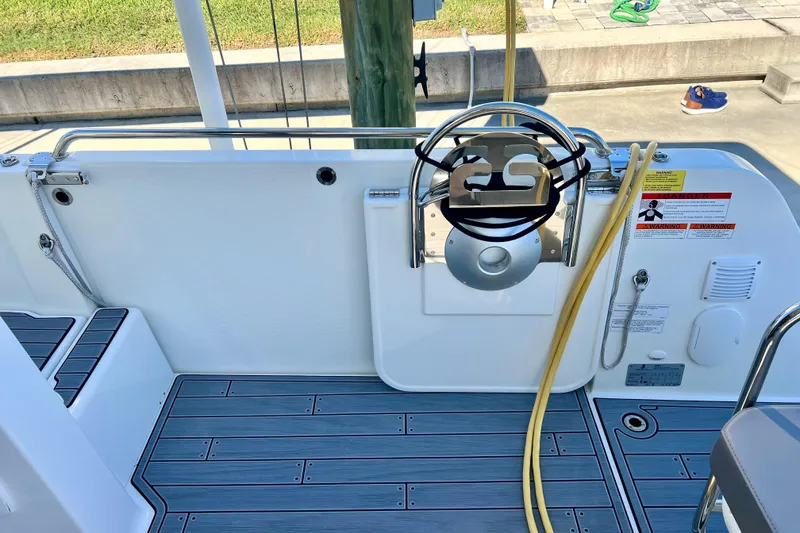 Slide: The Image of 2024 Beneteau Antares 11 boat deck with safety features and modern design. - 18