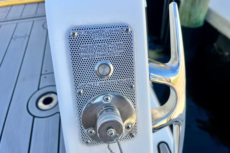Slide: The Image of Outboard flushing system on 2024 Beneteau Antares 11 boat deck. - 25
