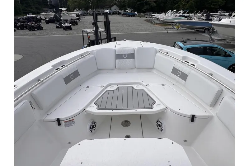 Slide: The Image of 2025 Sea Fox 288 Commander boat interior with spacious seating and storage. - 15