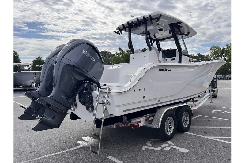 Slide: The Image of 2025 Sea Fox 288 Commander boat on trailer with twin Yamaha outboard engines. - 5