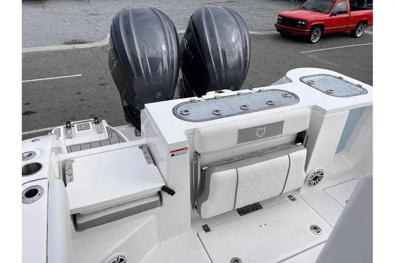 Slide: The Image of 2025 Sea Fox 288 Commander boat with dual outboard engines and spacious deck. - 8