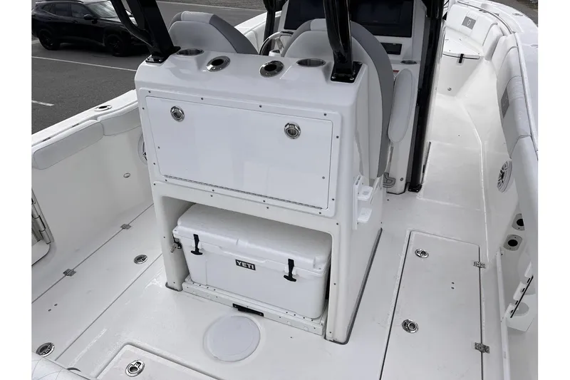 Slide: The Image of 2025 Sea Fox 288 Commander boat interior with storage and cooler. - 9