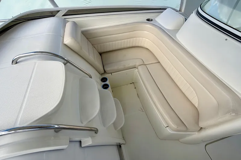 Slide: The Image of 2008 Hydra-Sports Vector 3500 VX boat interior with white cushioned seating and stainless steel railings. - 17