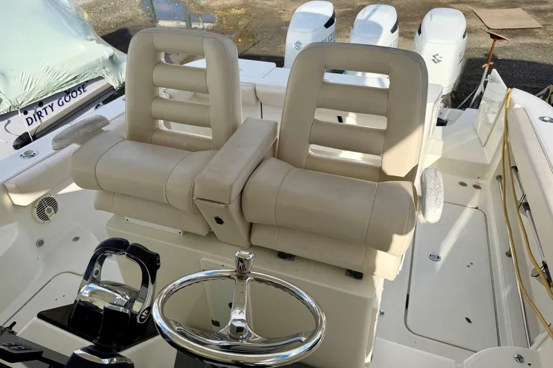 Slide: The Image of 2008 Hydra-Sports Vector 3500 VX boat interior with dual captain's chairs and steering wheel. - 31