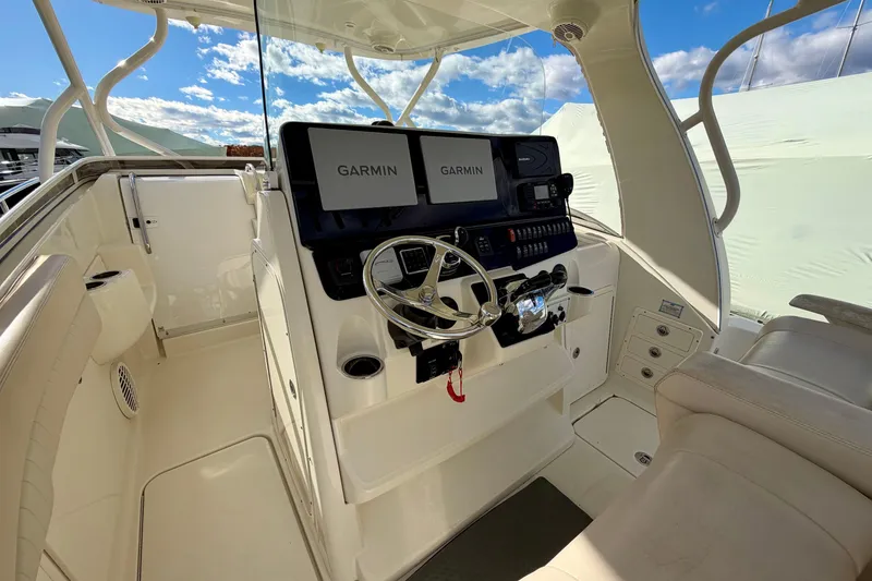 Slide: The Image of 2008 Hydra-Sports Vector 3500 VX helm with Garmin navigation system, sunny day. - 32