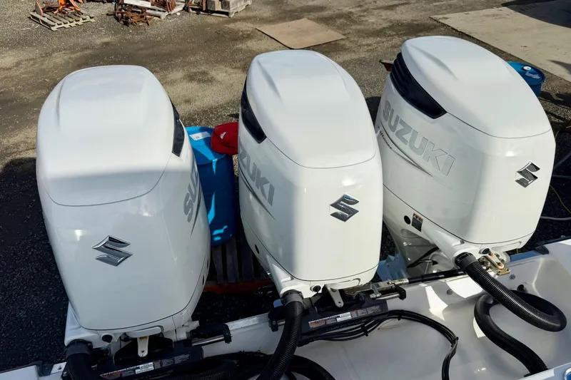 Slide: The Image of Triple Suzuki outboard motors on a 2008 Hydra-Sports Vector 3500 VX boat. - 42