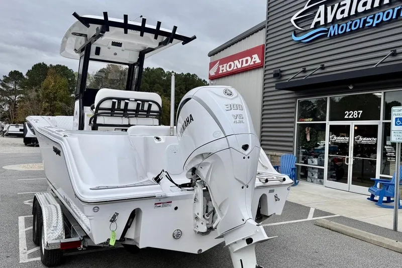 Slide: The Image of 2026 Sea Fox 248 Commander boat with Yamaha 300 V6 engine at dealership. - 3