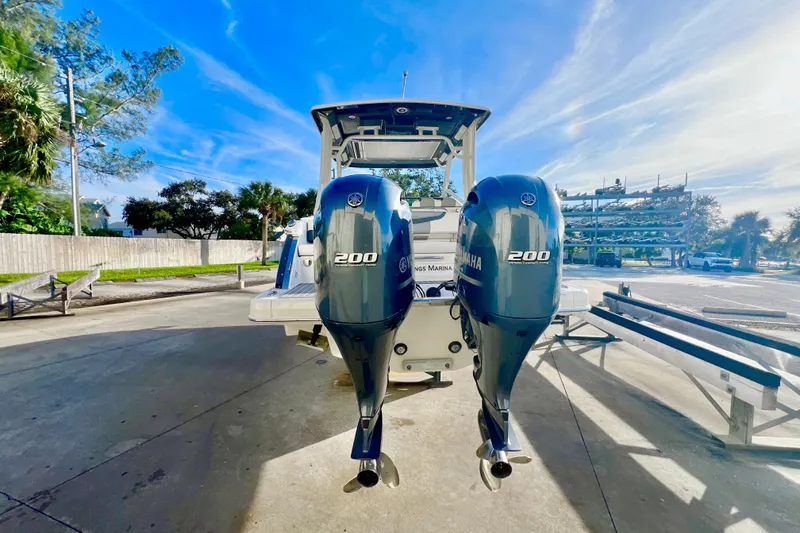 Slide: The Image of 2021 Chaparral 280 OSX boat with Yamaha engine on display outdoors. - 3