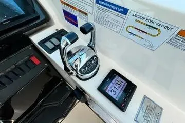 Slide: The Image of Control panel of 2019 Tiara Yachts 4300 Open with throttle and digital display. - 10