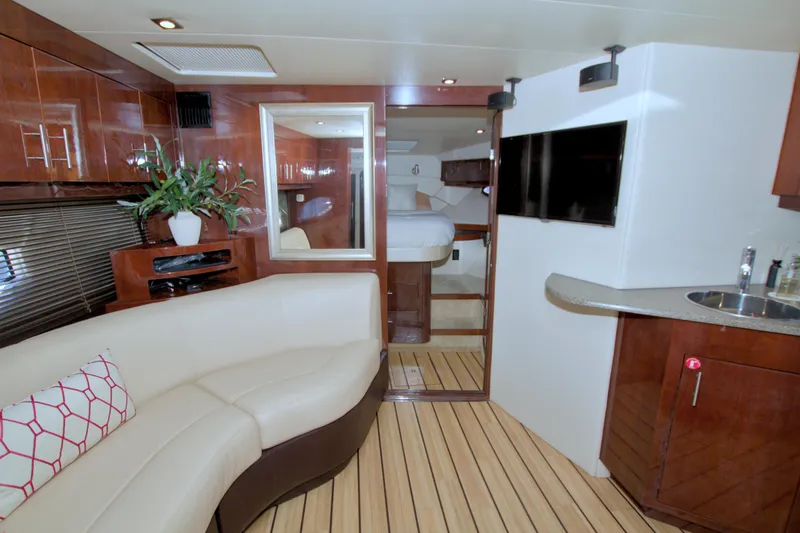 Slide: The Image of Luxurious interior of 2014 Regal 46 Sport Coupe yacht with modern amenities. - 42