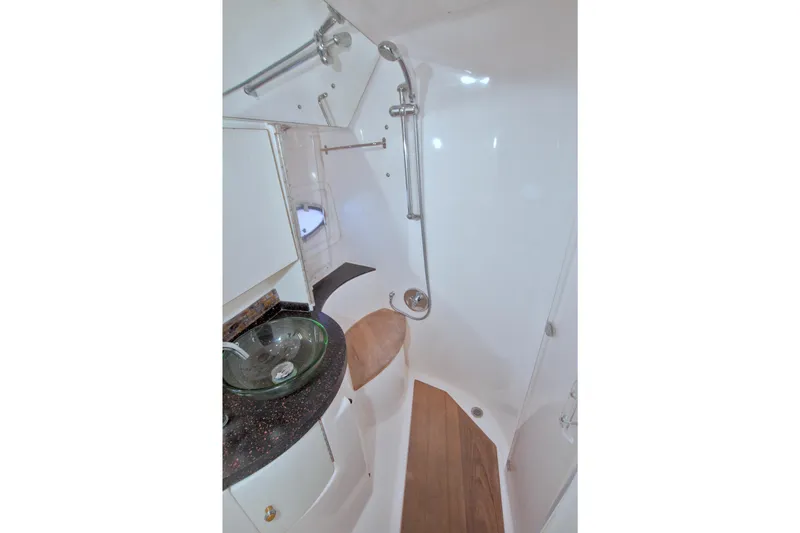 Slide: The Image of Luxurious bathroom in 2014 Regal 46 Sport Coupe yacht with modern fixtures. - 50