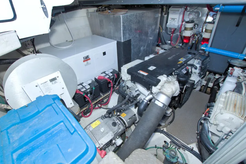 Slide: The Image of Engine room of 2014 Regal 46 Sport Coupe with visible machinery and components. - 66