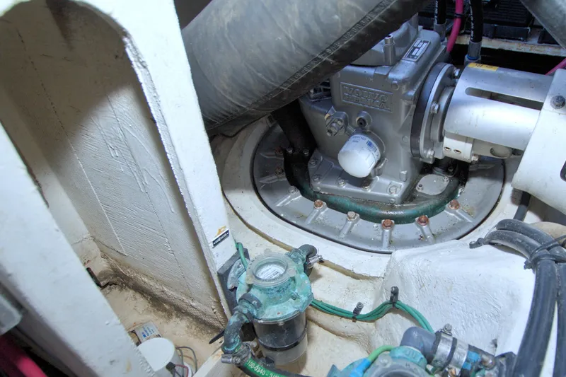 Slide: The Image of Engine compartment of a 2014 Regal 46 Sport Coupe with visible mechanical components. - 81